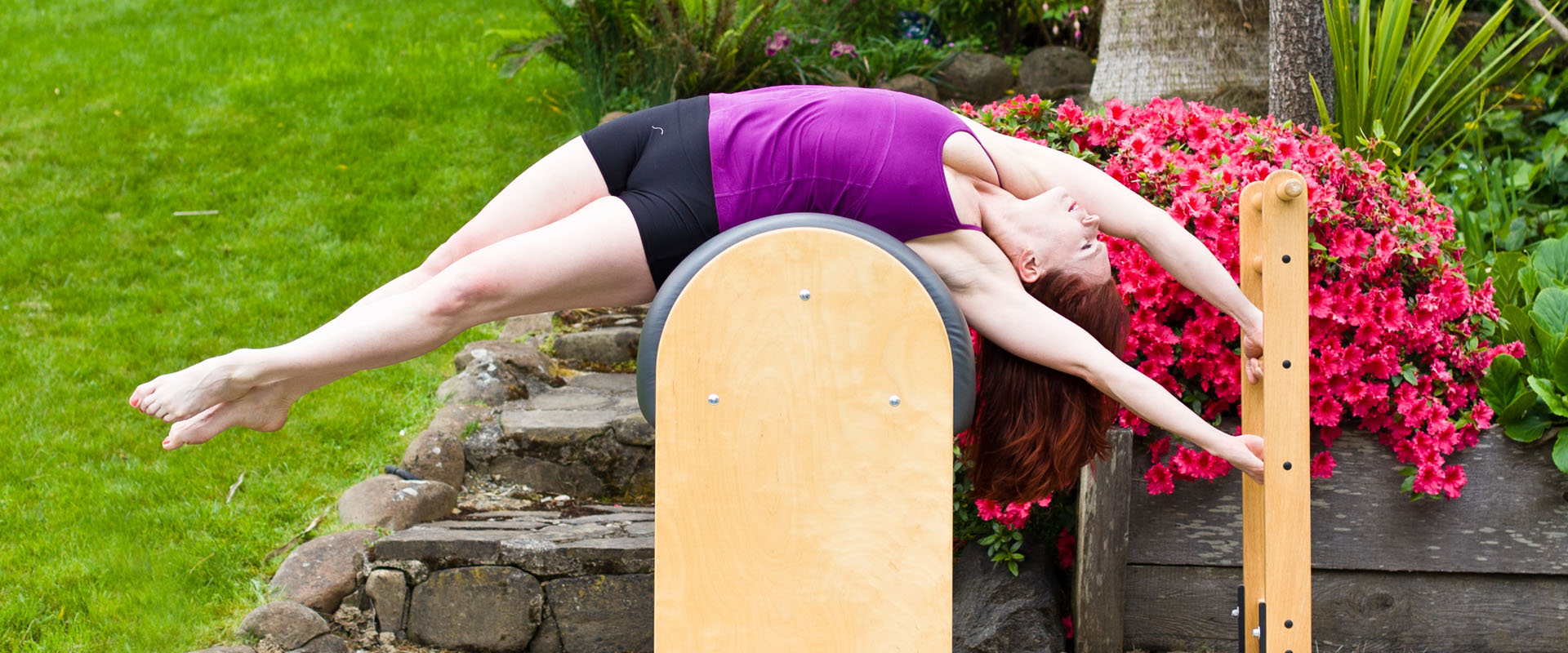 Students on Lolita's Legacy Comprehensive Pilates Teacher Training Course  learning to teach on the Ladder Barrel. All our Pilates Apparatus are made  by Balanced Body - Picture of Balans Pilates Studio 